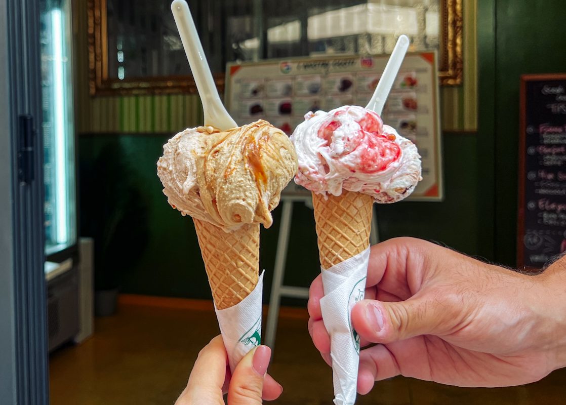 2 hands holding 2 gelatos in 4 day in Florence Itinerary cover photo